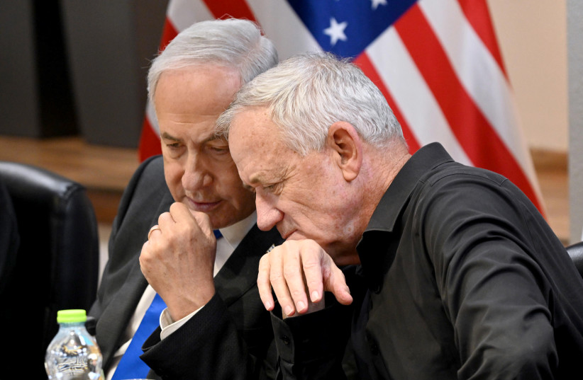  Prime Minister Benjamin Netanyahu and National Unity Head Benny Gantz, October 12, 2023. (credit: CHAIM TZACH/GPO)