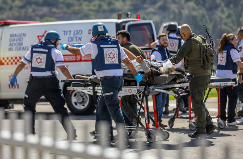 Wounded Israeli soldiers from the south arrive to the Hadassah Ein Kerem Medical Center in Jerusalem, October 7, 2023. (credit: NOAM REVKIN FENTON/FLASH90)