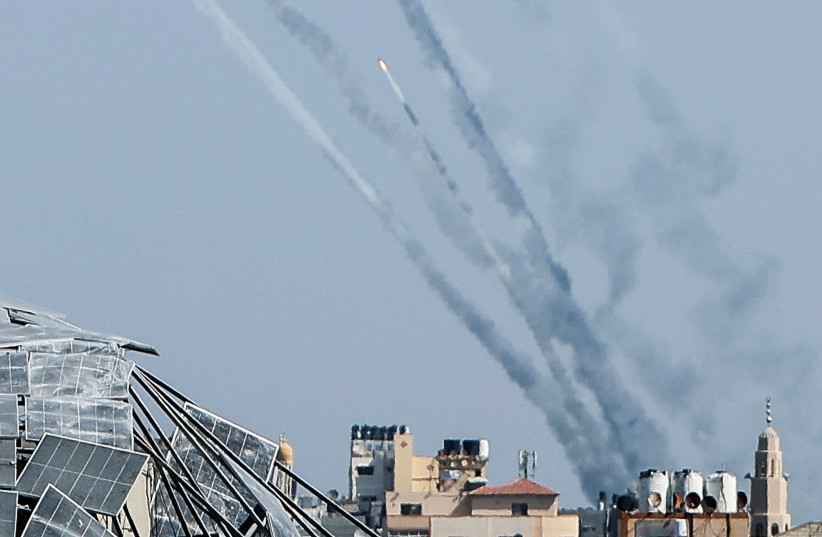  Rockets are fired from Gaza towards Israel, in Gaza, October 13, 2023 (credit: MOHAMMED SALEM/REUTERS)