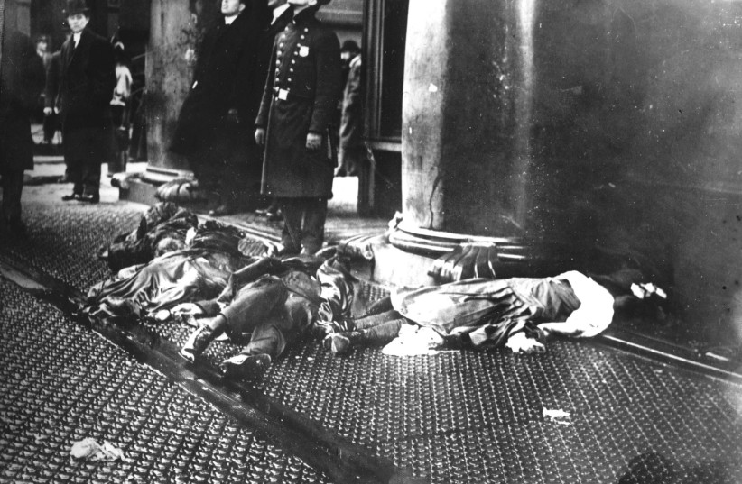  Bodies of workers who jumped from windows to escape the Triangle Shirtwaist Factory fire, March 25, 1911. (credit: Wikimedia Commons)