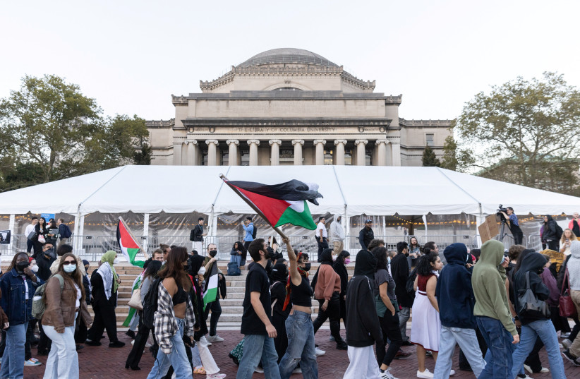  Pro-Palestinian students take part in a protest in support of the Palestinians amid the ongoing conflict in Gaza, at Columbia University in New York City, U.S., October 12, 2023. (credit: REUTERS/JEENAH MOON)