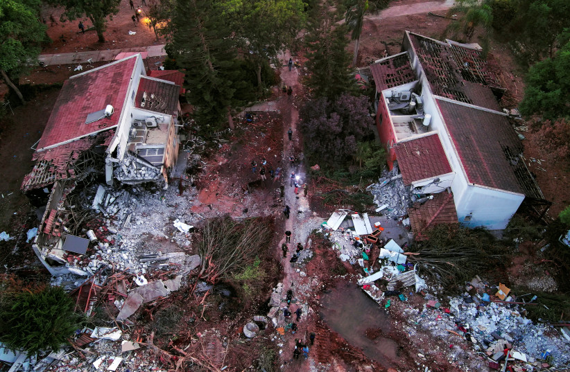  An aerial view shows damage caused following a mass infiltration by Hamas gunmen from the Gaza Strip, in Kibbutz Beeri in southern Israel, October 11, 2023. (credit: REUTERS/ILAN ROSENBERG)