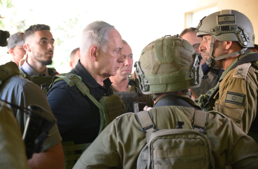  Prime Minister Benjamin Netanyahu meets with soldiers in southern Israel on October 14, 2023 (credit: Avi Ohayon/GPO)