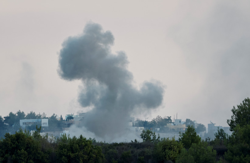  Smoke rises after Israeli shelling , as seen from Lebanese side, near the border with Israel, in Alma Al-Shaab, southern Lebanon, October 13, 2023 (credit: REUTERS/THAIER AL-SUDANI)
