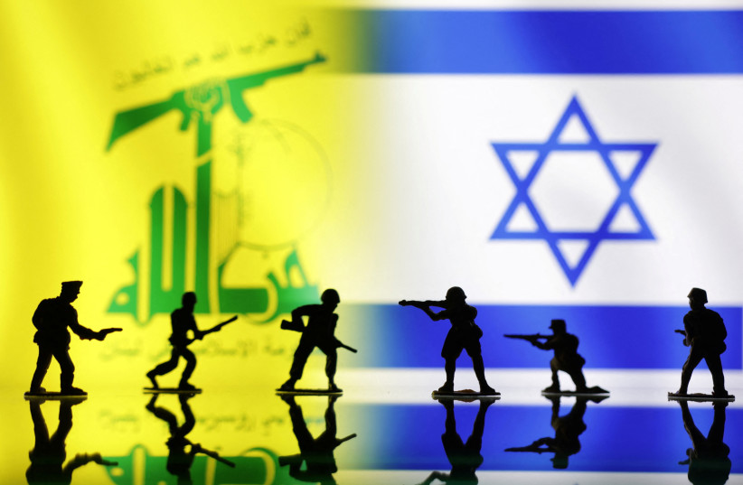  Toy soldiers, Hezbollah and Israel flags are seen in this illustration taken, October 15, 2023. (credit: REUTERS/DADO RUVIC/ILLUSTRATION)