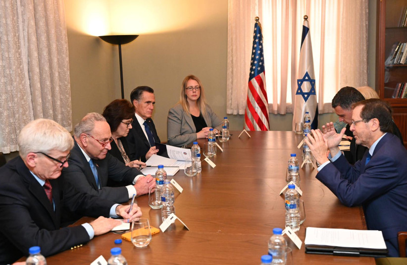 Majority leader in the US Senate Chuck Schumer and a bipartisan delegation meet with President Isaac Herzog. October 15, 2023 (credit: CHAIM TZACH/GPO)