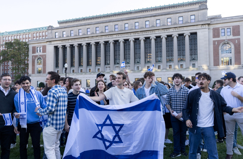  Pro-Israel students take part in a protest in support of Israel amid the ongoing conflict in Gaza, at Columbia University in New York City, US, October 12, 2023.  (credit: JEENAH MOON/REUTERS)