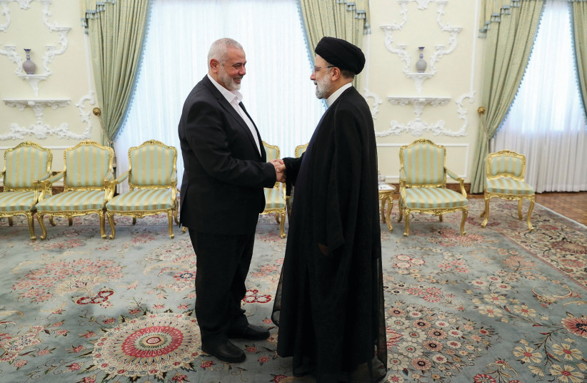  HAMAS LEADER Ismail Haniyeh meets Iran’s President Ebrahim Raisi in Tehran, in June. According to a recent poll, if elections were held in the Palestinian Authority, Haniyeh would defeat PA President Mahmoud Abbas. (credit: Iran's Presidency/West Asia News Agency/Reuters)