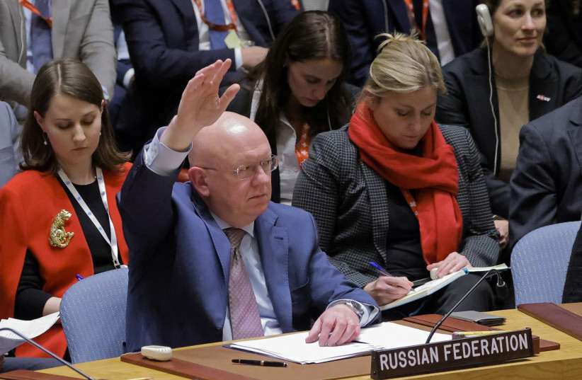 Russian Ambassador to the UN Vassily Nebenzia votes in favor of the resolution during a meeting of the United Nations Security Council on the conflict between Israel and Hamas at U.N. headquarters in New York, US, October 16, 2023 (credit: Andrew Kelly/Reuters)