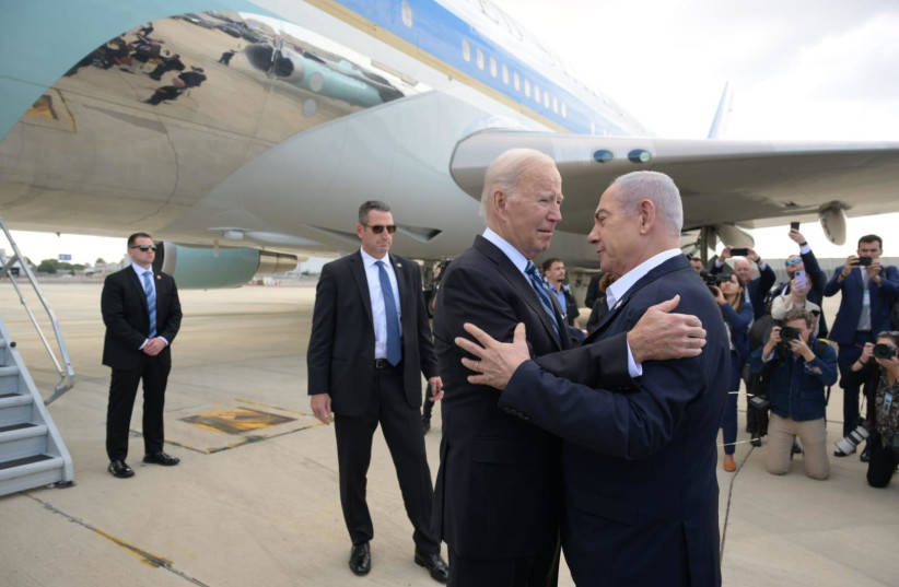 US President Joe Biden is welcomed by Israeli Prime Minster Benjamin Netanyahu, as he visits Israel amid the ongoing conflict between Israel and Hamas, in Tel Aviv, Israel, October 18, 2023 (credit: Avi Ohayon/GPO)