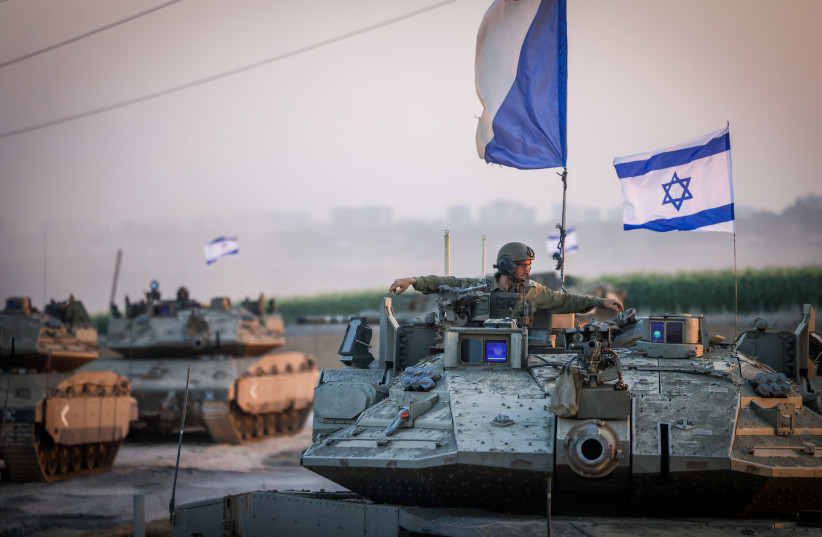  A CONVOY of Israeli tanks near the border with Gaza. (credit: Chaim Goldberg/Flash90)