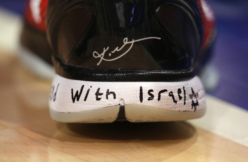 Stand with Israel written on a sneaker worn by Washington Wizards forward Deni Avdija (8) during the second quarter against the New York Knicks at Madison Square Garden. (credit: BRAD PENNER/USA TODAY SPORTS VIA REUTERS)