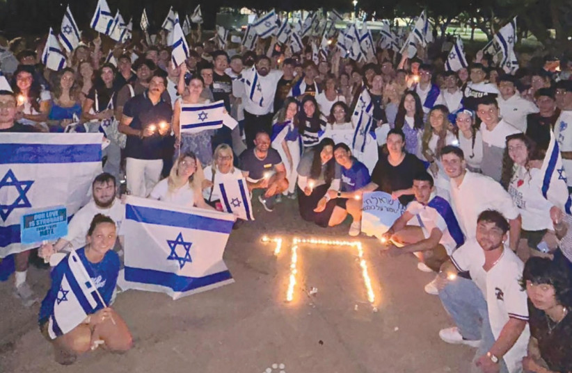  STUDENTS GATHER at a Chabad event, in support of Israel, at Arizona State University. (credit: ASU Chabad)