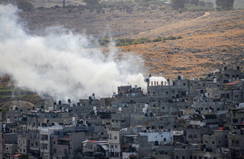 Smoke rises during a military raid in the West Bank city of Tulkarm, in the West Bank on October 19, 2023. (credit: NASSER ISHTAYEH/FLASH90)