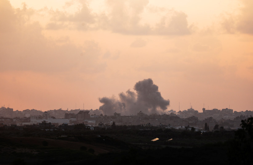  A view shows smoke in the Gaza Strip as seen from Israel's border with the Gaza Strip, in southern Israel October 19, 2023 (credit: AMIR COHEN/REUTERS)