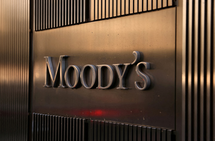  Signage is seen outside the Moody's Corporation headquarters in Manhattan, New York, U.S., November 12, 2021 (credit: REUTERS/FILE PHOTO)