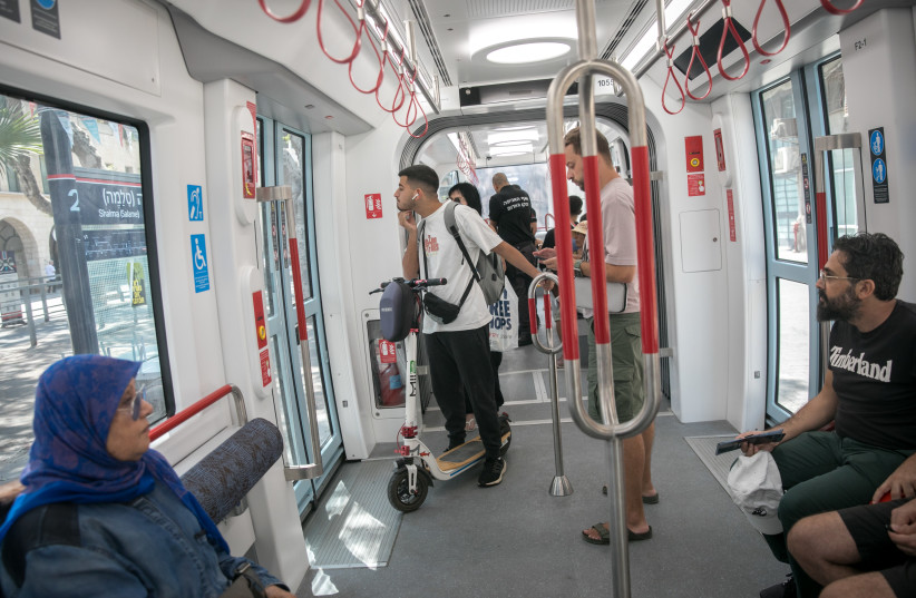  People ride the new Metropolitan Light Rail on September 6, 2023. The Light Rail runs through Tel Aviv and surrounding central cities. (credit: MIRIAM ALSTER/FLASH90)