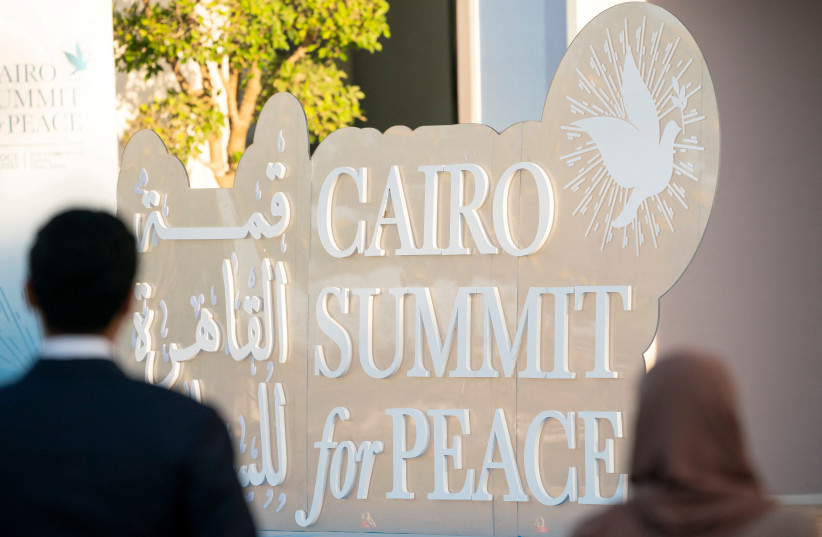 A sign at the entrance of the Cairo Summit for Peace at the St Regis Almasra Hotel is seen in Cairo, Egypt, October 21, 2023. (credit: Hamad Al Kaabi/UAE Presidential Court/Handout via REUTERS)