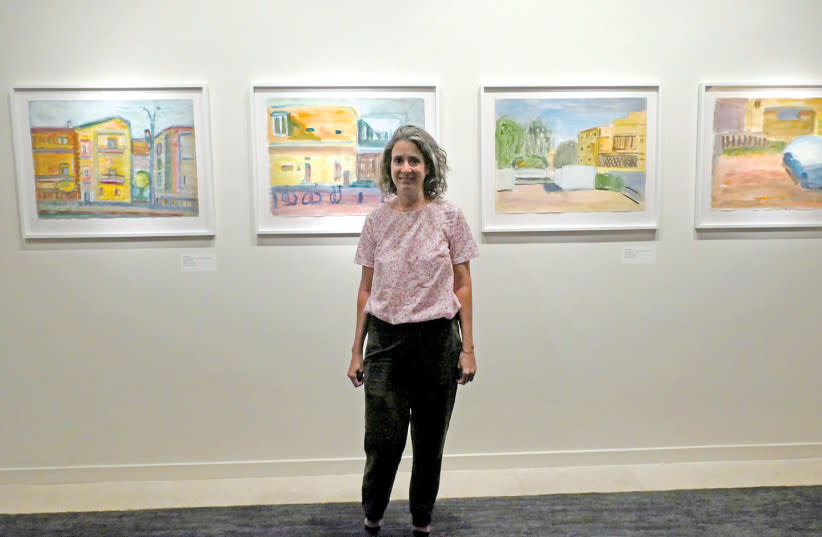  YONAT CINTRA in front of her series 'The Love Song to the Neighborhood,' painted during the pandemic. (credit: LOLA VILENKIN)