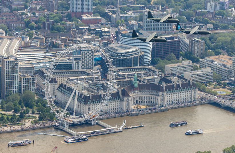 C130 Hercules aircraft from RAF Brize Norton fly near the London Eye, on the day of Trooping the Colour parade to honour King Charles's official birthday, in London, Britain, June 17, 2023 (credit: AS1 Jake Hobbs/MOD Crown Copyright 2023/Handout via REUTERS)