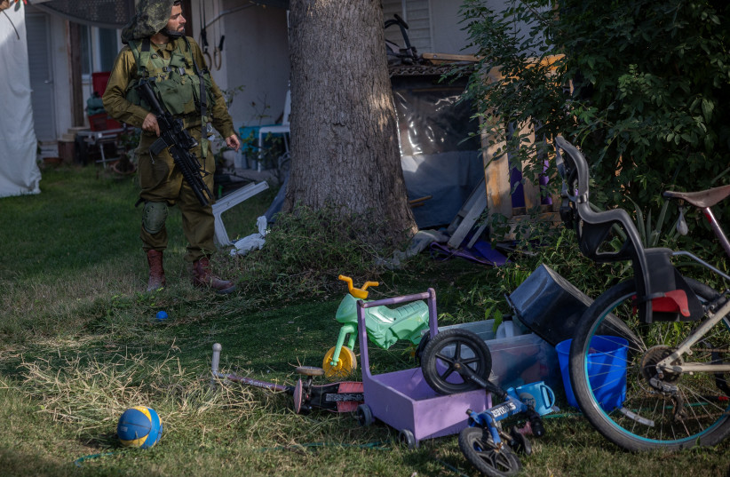  The destruction caused by Hamas terrorists when they infiltrated Kibbutz Be'eri, near the Israeli-Gaza border, southern Israel. October 17, 2023.  (credit: YONATAN SINDEL/FLASH90)