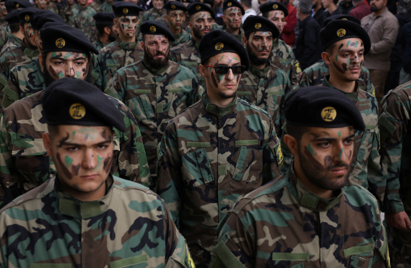  People take part in the funeral of Hezbollah member Abbas Shuman, who was killed in southern Lebanon amid tension between Israel and Hezbollah, during his funeral, in Baalbek, Lebanon, October 23, 2023 (credit: REUTERS/AMR ALFIKY)
