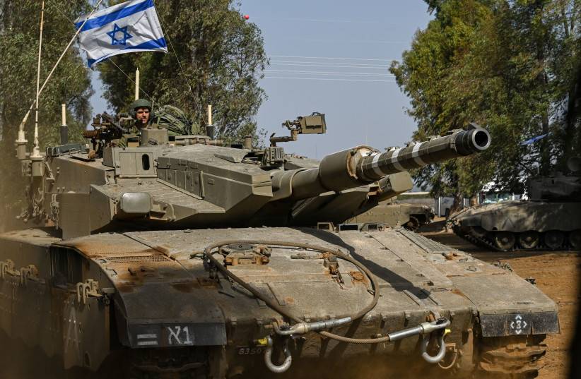 IDF reserve Infantry and Merkava Tank soldiers train in a military exercise in the Golan Heights on October 23, 2023 (credit: MICHAEL GILADI/FLASH90)