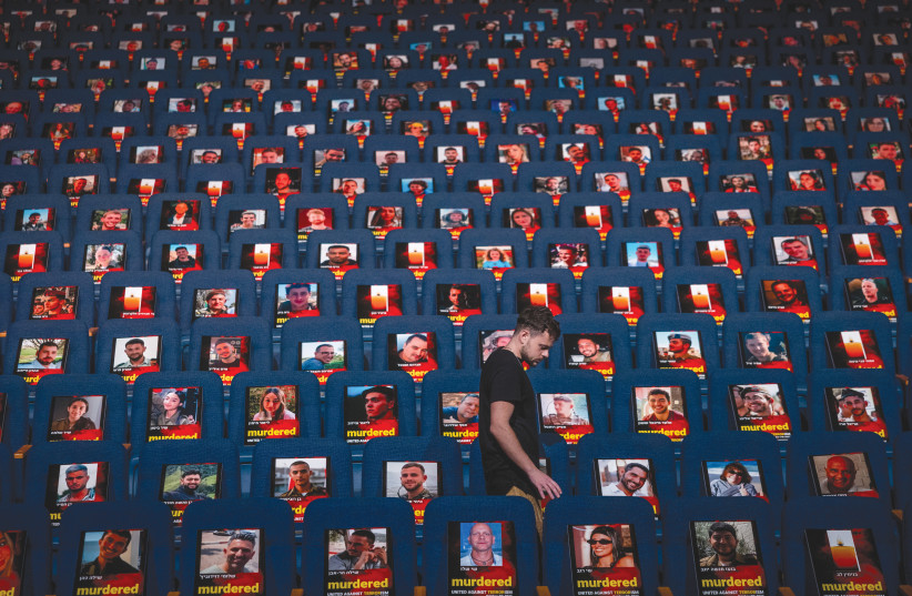  PHOTOS OF those abducted, missing, or killed in the Hamas terrorist attack of October 7, in southern Israel, are displayed in the Smolarz Auditorium at Tel Aviv University. (credit: YONATAN SINDEL/FLASH90)