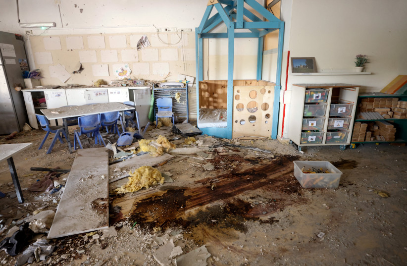  A damaged and blood-stained kindergarten is seen following a deadly infiltration by Hamas gunmen from the Gaza Strip, in Kibbutz Beeri in southern Israel October 22, 2023. (credit: REUTERS/AMIR COHEN)