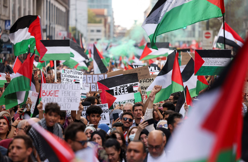  People demonstrate to express support for the Palestinians during a protest in Milan, Italy October 14, 2023. (credit: REUTERS/CLAUDIA GRECO)
