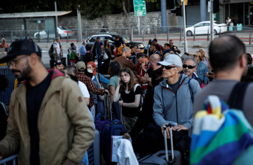  U.S. nationals and their immediate family members wait before leaving Israel on a ship headed for Cyprus, amid the ongoing conflict between Israel and the Palestinian Islamist group Hamas, in Haifa, Israel, October 16, 2023. (credit: REUTERS/SHIR TOREM)