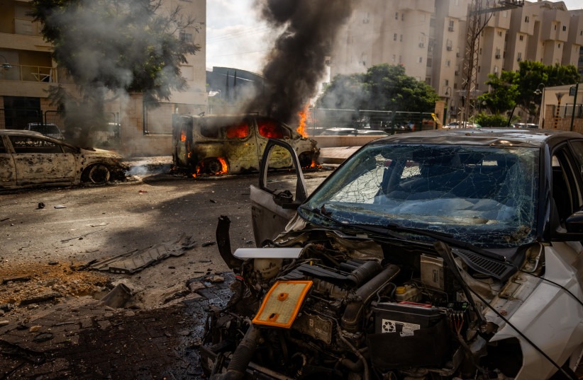  The scene where a rocket fired from Gaza into Southern Israel, hit and caused damaged in the southern Israeli city of Ashkelon, October 7, 2023. (credit: OREN BEN HAKOON/FLASH90)