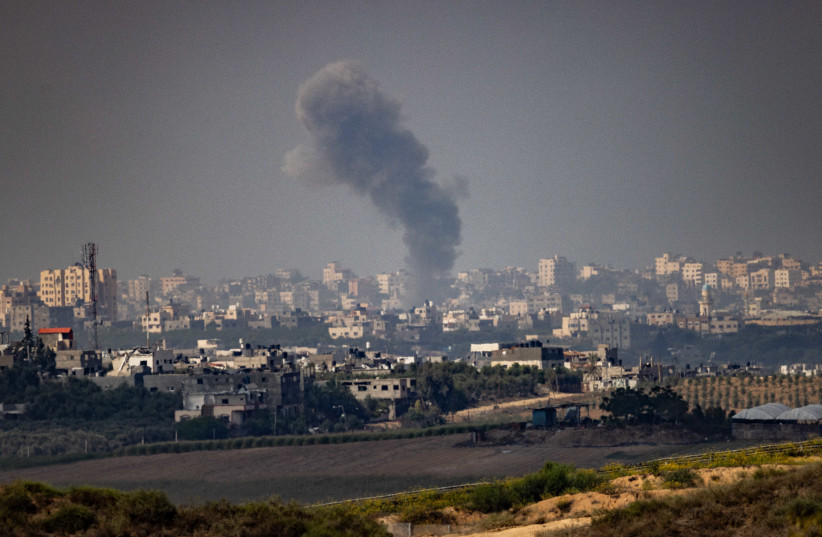  View of houses destroyed in Israeli air strikes, in the Gaza Strip, as seen from the Israeli side on October 24, 2023 (credit: YONATAN SINDEL/FLASH90)