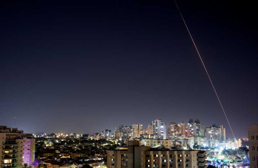 A view shows a rocket being launched from the Gaza Strip towards central Israel, as seen from Ashkelon in southern Israel October 25, 2023 (credit: AMIR COHEN/REUTERS)