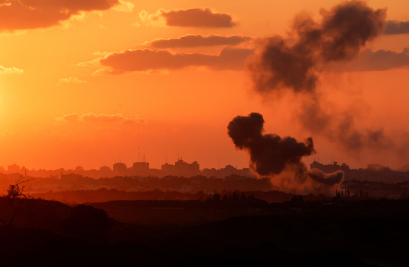  A view shows smoke in the Gaza Strip as seen from Israel's border with the Gaza Strip, in southern Israel October 18, 2023 (credit: REUTERS/AMIR COHEN)