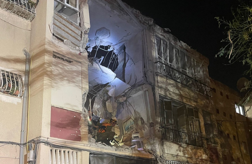  The aftermath of a direct rocket impact on an apartment building in Rishon Lezion on October 25, 2023 (credit: MOR ALONI/MAARIV)