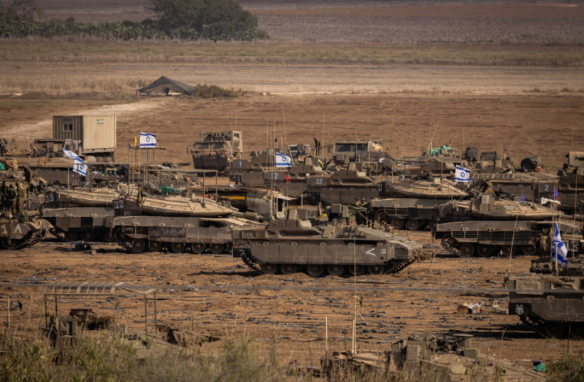 Israeli soldiers at a staging area near the Israeli-Gaza border, October 24, 2023