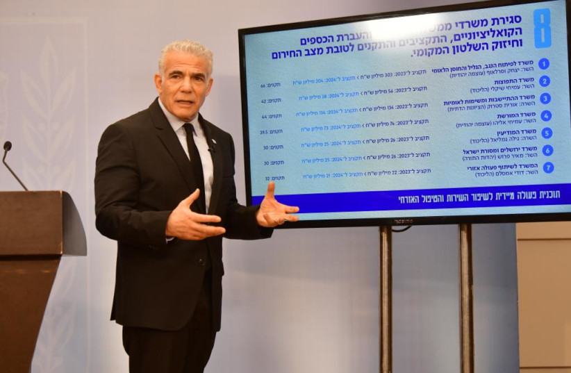  Opposition leader Yair Lapid presents his eight-part plan to better care for civilians affected by Israel's war with Hamas, October 26, 2023 (credit: AVSHALOM SASSONI/MAARIV)