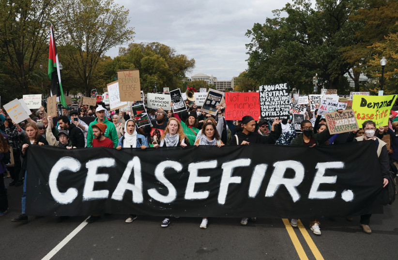  PROTESTERS MARCH past the US Capitol Building in Washington last week, calling for a ceasefire in Gaza. (credit: REUTERS/LEAH MILLIS)