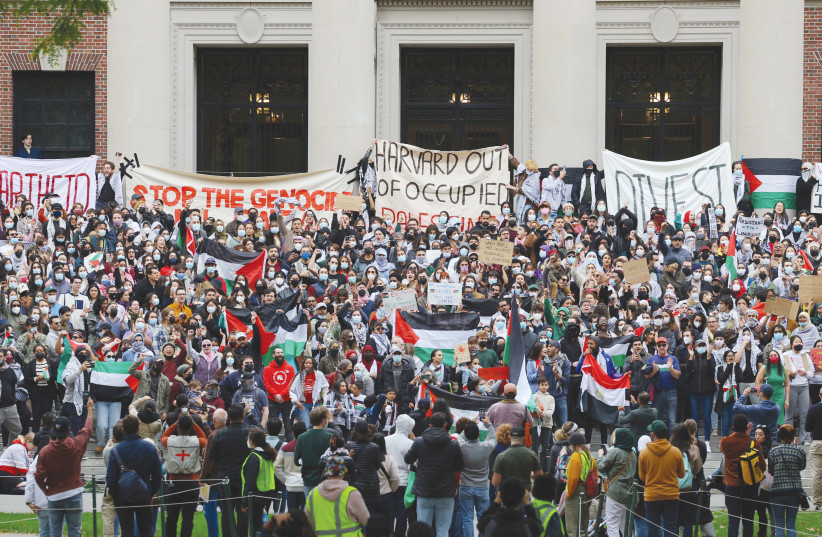 PROTESTERS RALLY against Israel at Harvard University, October 2023 (credit: BRIAN SNYDER/REUTERS)