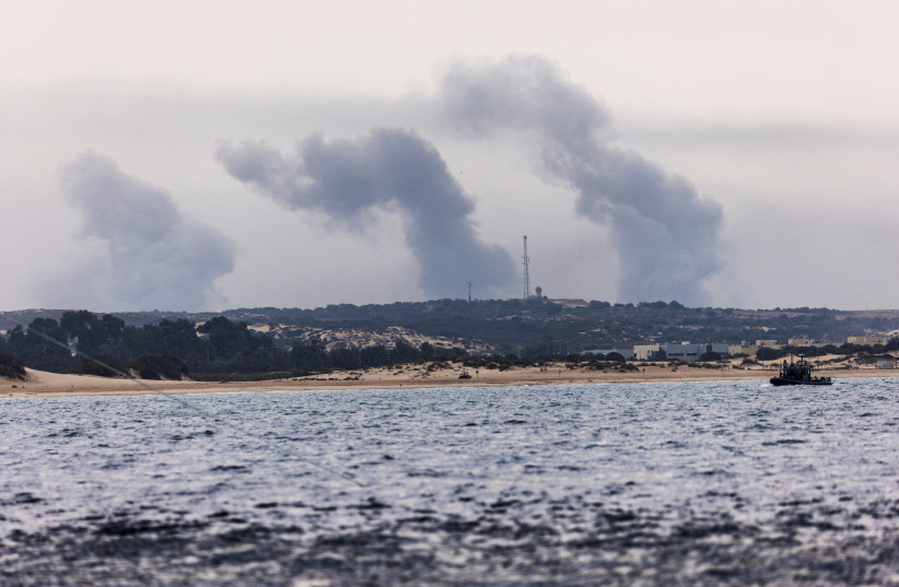  Smoke rises over Gaza, as seen from Israel's maritime border with Gaza in southern Israel October 27, 2023 (credit: REUTERS/AMIR COHEN)