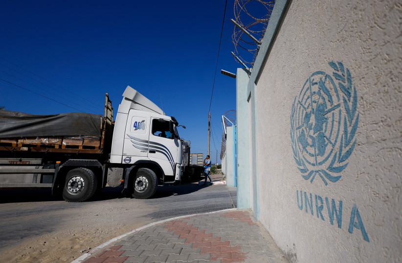  An aid truck arrives at a UN storage facility as the conflict between Israel and Palestinian Islamist group Hamas continues, in the central Gaza Strip October 21, 2023 (credit: REUTERS/MOHAMMED SALEM)