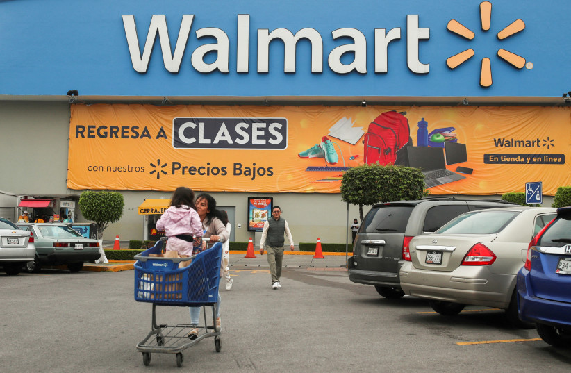  The logo of Walmart is pictured outside a store in Mexico City, Mexico July 27, 2023. (credit: REUTERS/HENRY ROMERO)