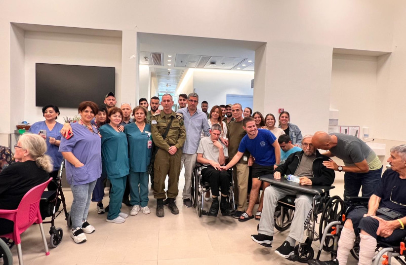  IDF spokesman Brigadier-General Daniel Hagari went to Adi Negev-Nahalat Eran in the Eshkol region to visit his very-disabled brother, Yoni, who was one of the first residents of the village. (credit: Adi Negev-Nahalat Eran)