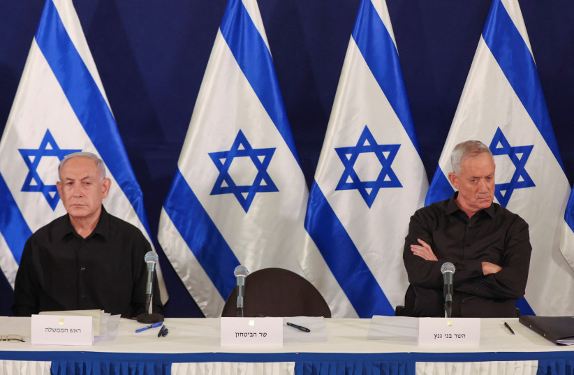  Israeli prime minister Benjamin Netanyahu and Cabinet minister Benny Gantz during a press conference in the Kirya military base in Tel Aviv , Israel , 28 October 2023. (credit: BIR SULTAN POOL/Pool via REUTERS)
