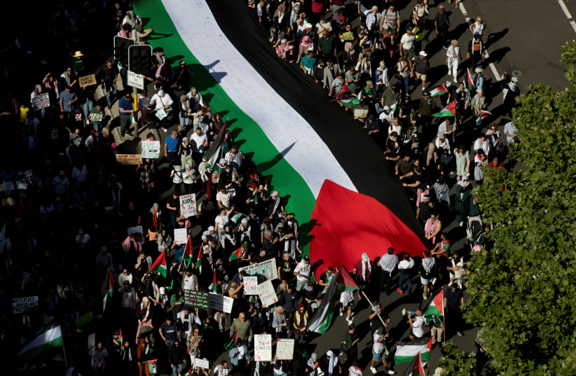  Participants take part in a rally in support of Palestinians, in Hyde Park, Sydney, Australia October 29, 2023 (credit: AAP IMAGE/BRENT LEWIN VIA REUTERS)