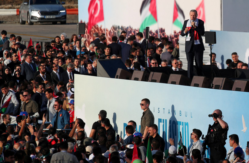  Turkish President Tayyip Erdogan speaks during a rally in solidarity with Palestinians in Gaza, amid the ongoing conflict between Israel and the Palestinian Islamist group Hamas, in Istanbul, Turkey October 28, 2023. (credit: REUTERS/DILARA SENKAYA)