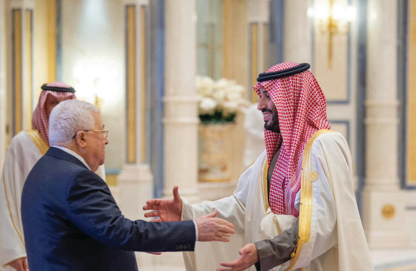  SAUDI CROWN Prince Mohammed Bin Salman welcomes Palestinian Authority head Mahmoud Abbas at a China-Arab summit in Riyadh last year. (credit: SAUDI PRESS AGENCY/REUTERS)