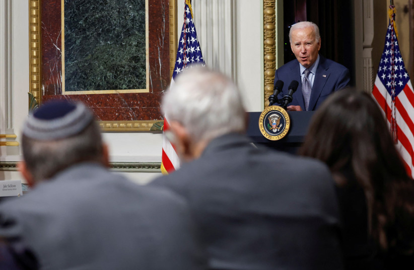  U.S. President Joe Biden participates in a roundtable with Jewish community leaders regarding the Palestine-Israel conflict, in the Eisenhower Executive Office Building on the White House campus in Washington, U.S. October 11, 2023. (credit: REUTERS/JONATHAN ERNST)