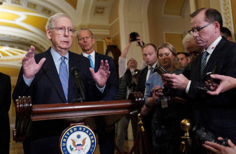  Top U.S. Senate Republican Mitch McConnell speaks to reporters at the Capitol in Washington, U.S., October 31, 2023.  (credit: REUTERS/KEVIN LAMARQUE)